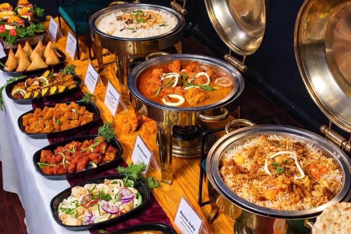 Live cooking station setup by The Curry Club Signature