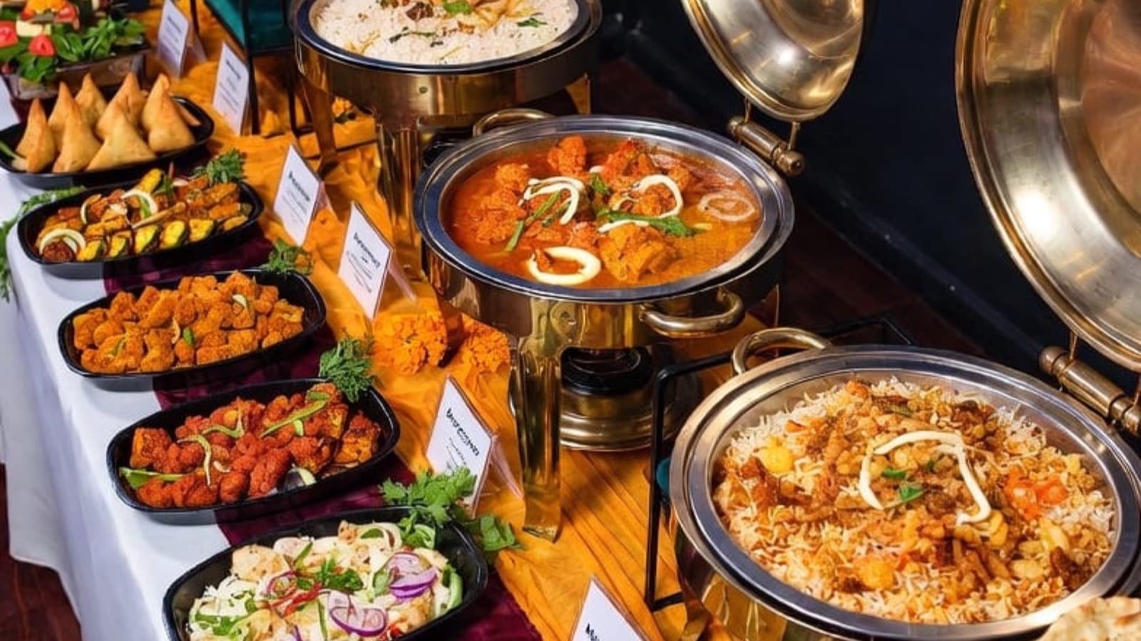South Indian buffet setup with chafing dishes by The Curry Club Signature